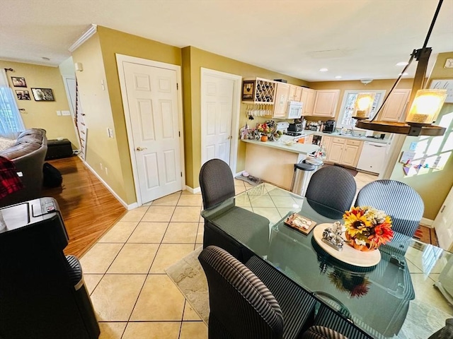 dining space with light tile patterned floors