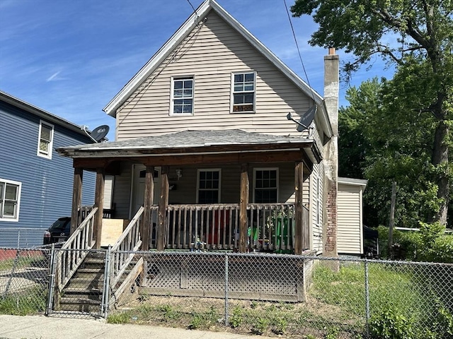 52 Burr St, Springfield, MA 01109 - view of front facade featuring a porch and a chimney
