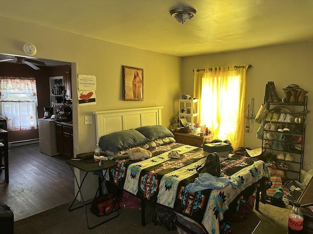 52 Burr St, Springfield, MA 01109 - bedroom featuring a baseboard heating unit and wood finished floors