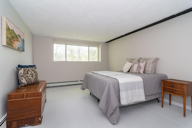 bedroom with baseboard heating and a baseboard radiator