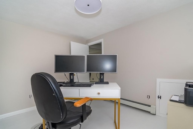 office area featuring a baseboard radiator and washer / dryer