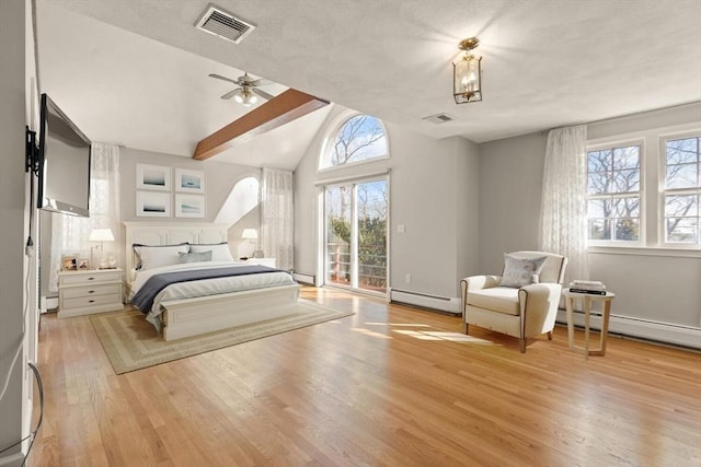 bedroom featuring a baseboard radiator, lofted ceiling, light wood-type flooring, access to exterior, and a baseboard heating unit