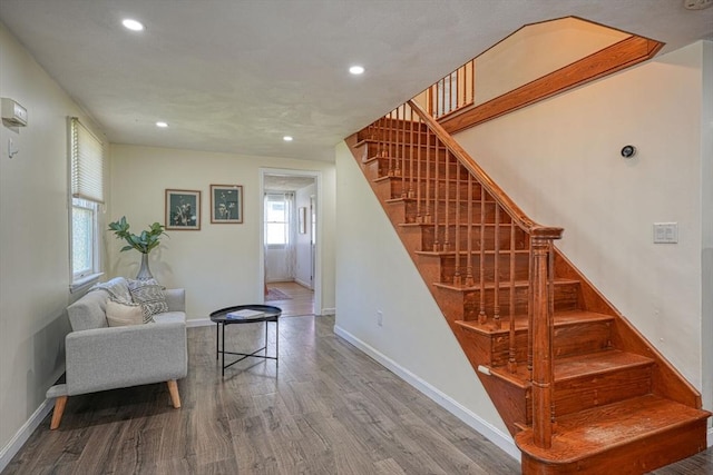 20 Fernglade Rd, Burlington, MA 01803 - stairs featuring baseboards, recessed lighting, and wood finished floors