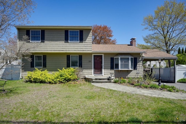 20 Fernglade Rd, Burlington, MA 01803 - traditional-style house with fence, a chimney, and a front yard