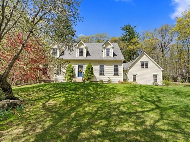 view of front of home with a front lawn
