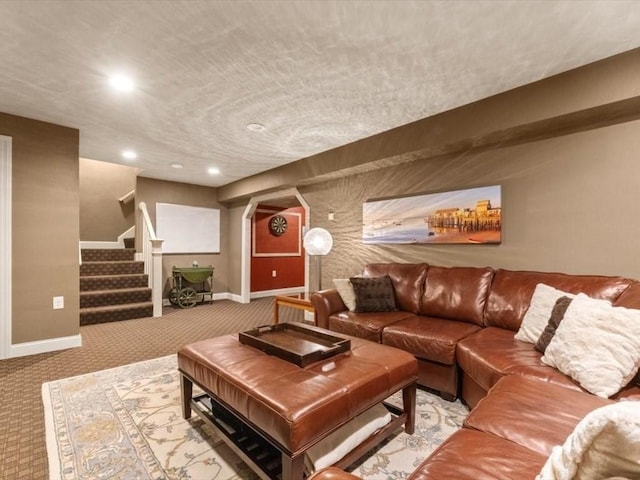living room with carpet floors, arched walkways, recessed lighting, baseboards, and stairway