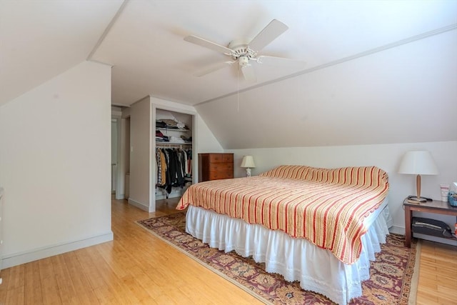 290 E St, Westwood, MA 02090 - bedroom featuring vaulted ceiling, light wood-style floors, a closet, and a ceiling fan