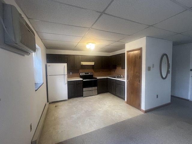 kitchen featuring a paneled ceiling, stainless steel range with electric stovetop, white fridge, baseboard heating, and dark brown cabinetry