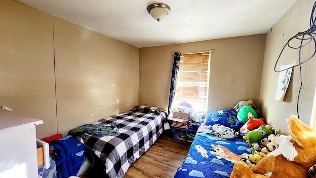 bedroom with wood-type flooring