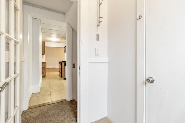 hallway with carpet flooring