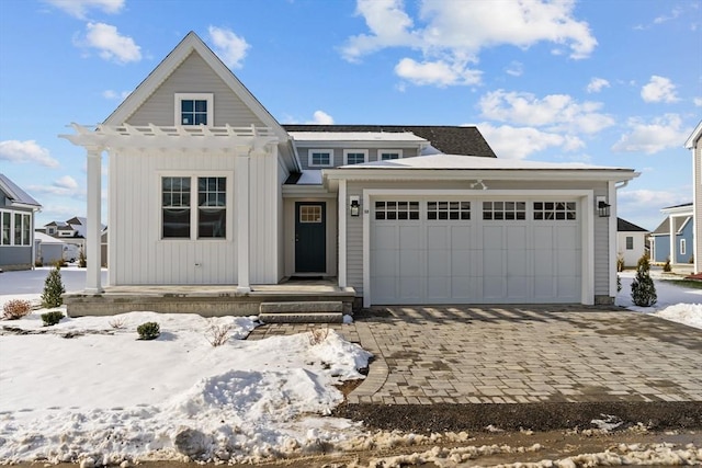 view of front of property featuring a garage