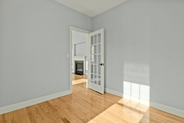 empty room with light wood-type flooring