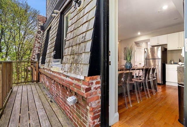exterior space with freestanding refrigerator