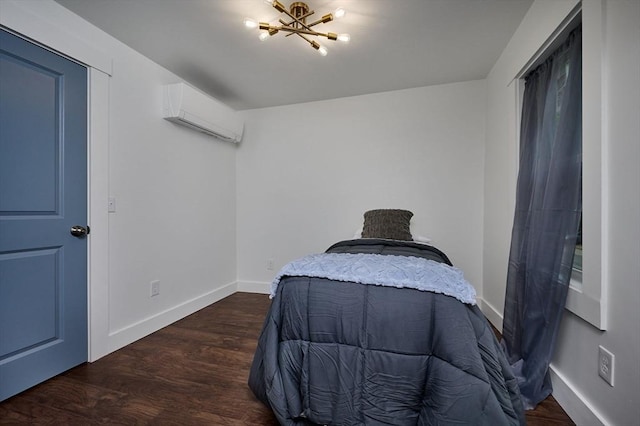 3030 Main St, Palmer, MA 01009 - bedroom featuring a wall mounted AC, wood finished floors, and a chandelier
