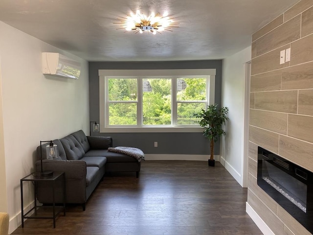 3030 Main St, Palmer, MA 01009 - living room with a wall mounted air conditioner, dark wood-type flooring, and a tiled fireplace