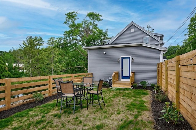 3030 Main St, Palmer, MA 01009 - back of house featuring a fenced backyard and outdoor dining area