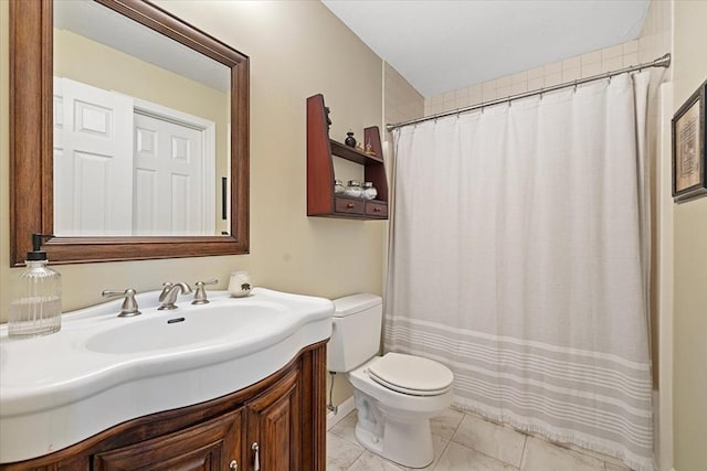 bathroom featuring vanity, tile patterned flooring, toilet, and a shower with curtain