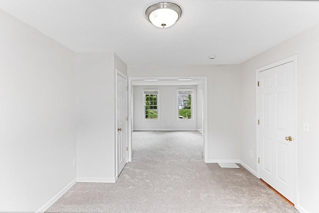 15 Pilgrim Rd, Mansfield, MA 02048 - hallway featuring light carpet and baseboards