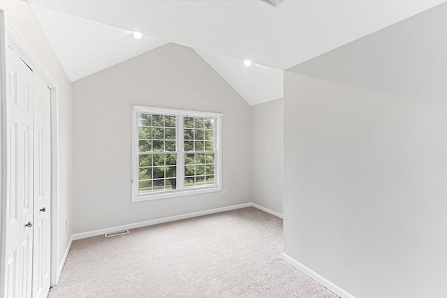 15 Pilgrim Rd, Mansfield, MA 02048 - additional living space featuring carpet, baseboards, and vaulted ceiling