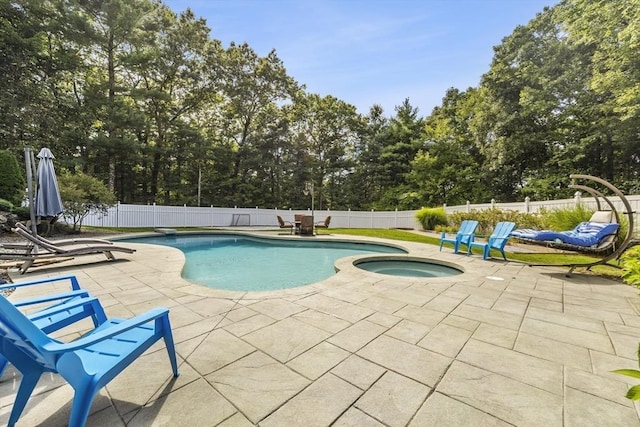 15 Pilgrim Rd, Mansfield, MA 02048 - view of pool with a patio area, a fenced backyard, view of wooded area, and a pool with connected hot tub