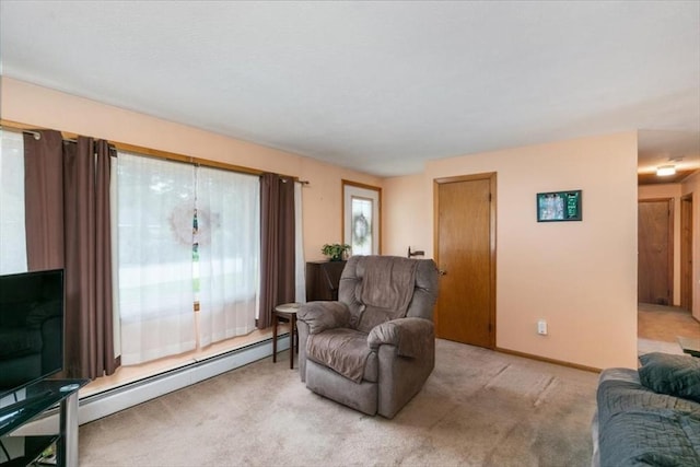 24 Alenclair, Amesbury, MA 01913 - carpeted living area with a baseboard heating unit