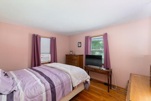 24 Alenclair, Amesbury, MA 01913 - bedroom featuring wood finished floors and cooling unit