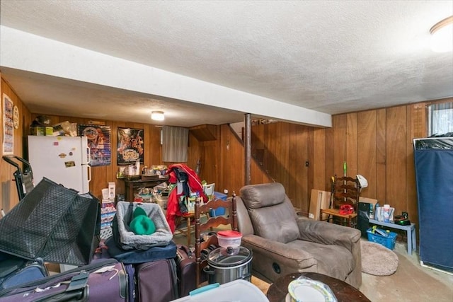 24 Alenclair, Amesbury, MA 01913 - living area with wood walls and a textured ceiling