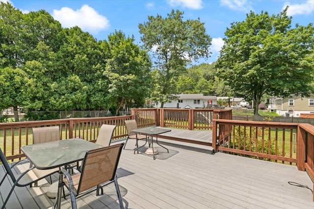 24 Alenclair, Amesbury, MA 01913 - wooden terrace featuring outdoor dining area and a fenced backyard