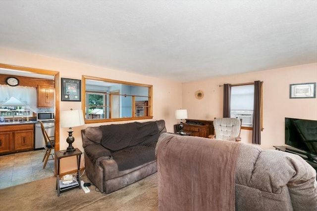 24 Alenclair, Amesbury, MA 01913 - living room featuring cooling unit, light carpet, and light tile patterned floors