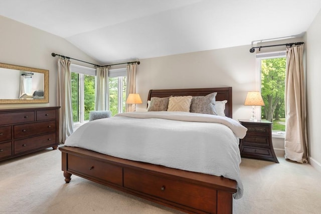 94 Mill Pond Unit 94, North Andover, MA 01845 - bedroom featuring light carpet, vaulted ceiling, multiple windows, and baseboards