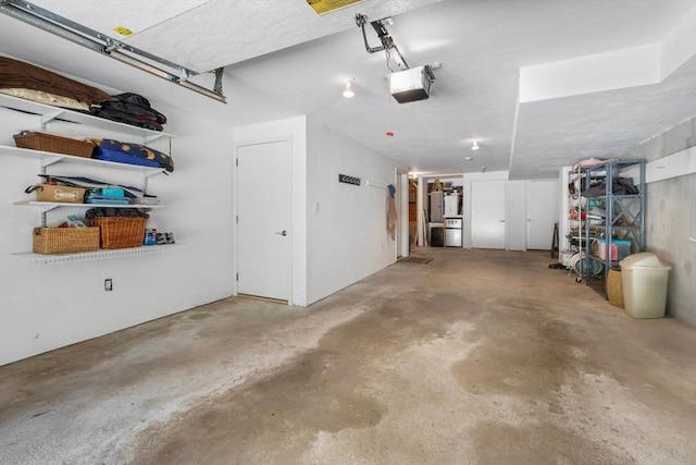 94 Mill Pond Unit 94, North Andover, MA 01845 - garage featuring a garage door opener