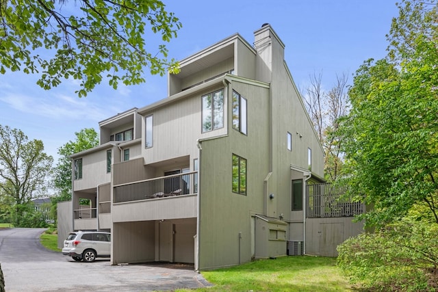 94 Mill Pond Unit 94, North Andover, MA 01845 - view of building exterior with central AC unit
