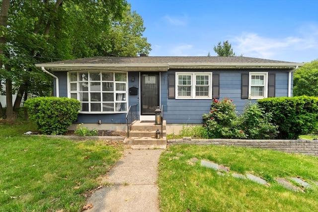 140 W Mountain St, Worcester, MA 01606 - view of front of home with entry steps and a front lawn