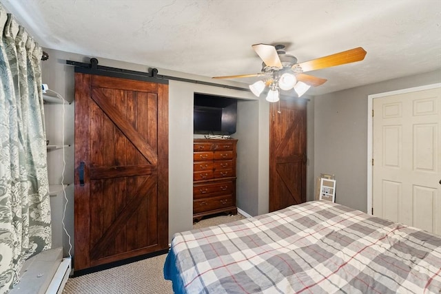 140 W Mountain St, Worcester, MA 01606 - bedroom featuring light carpet, a barn door, and ceiling fan