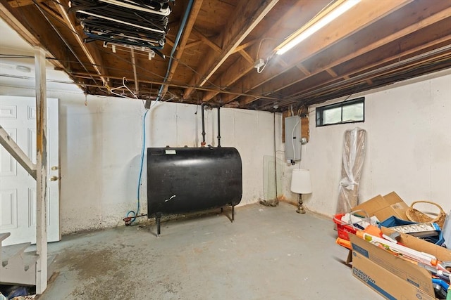 140 W Mountain St, Worcester, MA 01606 - basement with oil tank, electric panel, and stairway