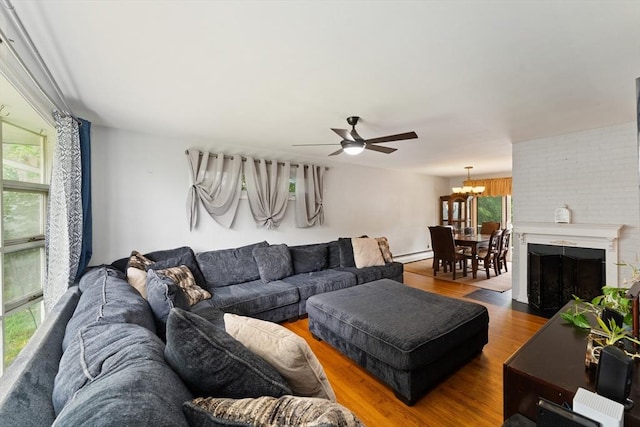 140 W Mountain St, Worcester, MA 01606 - living room with plenty of natural light, a ceiling fan, a chandelier, and wood finished floors