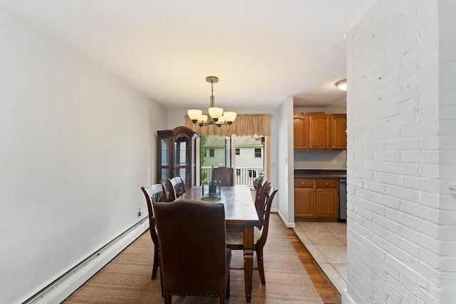 140 W Mountain St, Worcester, MA 01606 - dining room with a chandelier, a baseboard heating unit, and light wood-type flooring