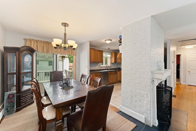 140 W Mountain St, Worcester, MA 01606 - dining space with a chandelier and a baseboard heating unit