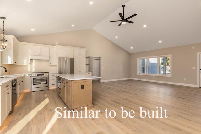 kitchen featuring pendant lighting, a kitchen island, white cabinetry, and appliances with stainless steel finishes