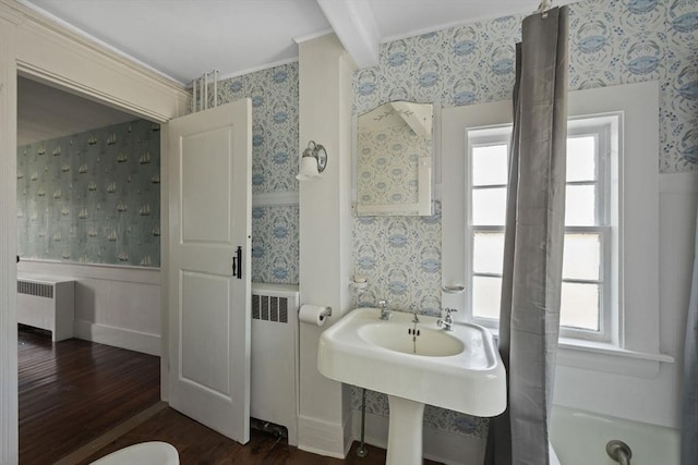 36 Uncle Barneys Rd, Dennis, MA 02670 - full bath featuring wallpapered walls, radiator, wood finished floors, a wainscoted wall, and healthy amount of natural light