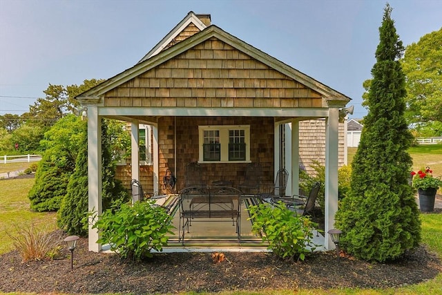 36 Uncle Barneys Rd, Dennis, MA 02670 - view of front facade featuring a porch