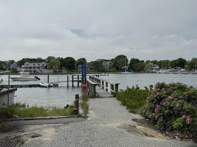 36 Uncle Barneys Rd, Dennis, MA 02670 - dock featuring a boat ramp and a water view