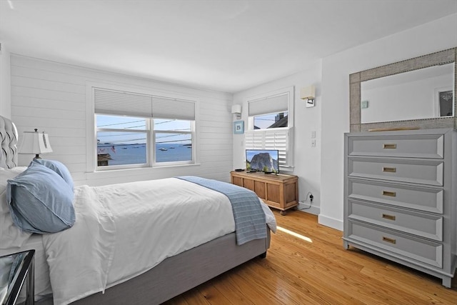 13 Selman St, Marblehead, MA 01945 - bedroom with light wood-style flooring and baseboards