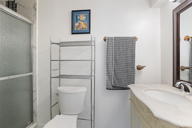 12 Temple Ave, Hudson, MA 01749 - bathroom featuring toilet, vanity, and a stall shower