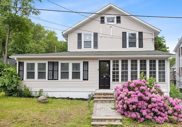 12 Temple Ave, Hudson, MA 01749 - view of front of home with entry steps, a front lawn, and a shingled roof