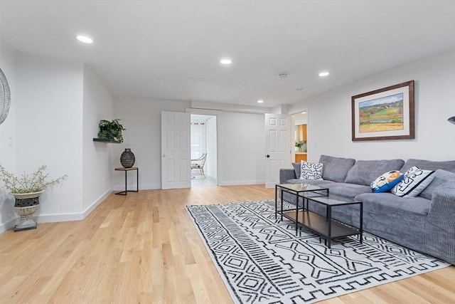 12 Temple Ave, Hudson, MA 01749 - living room featuring light wood-type flooring, recessed lighting, and baseboards