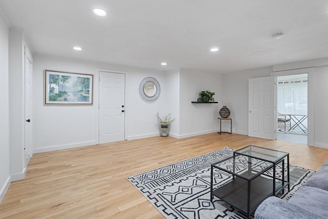 12 Temple Ave, Hudson, MA 01749 - living room featuring light wood-type flooring, recessed lighting, and baseboards