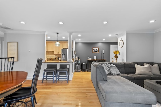 21 Starr Dr Unit 207, Narragansett, RI 02882 - living area featuring recessed lighting, ornamental molding, and light wood finished floors
