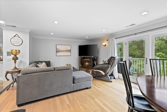 21 Starr Dr Unit 207, Narragansett, RI 02882 - living area featuring plenty of natural light, recessed lighting, light wood-style floors, and crown molding