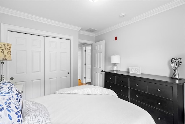 21 Starr Dr Unit 207, Narragansett, RI 02882 - bedroom featuring a closet and crown molding